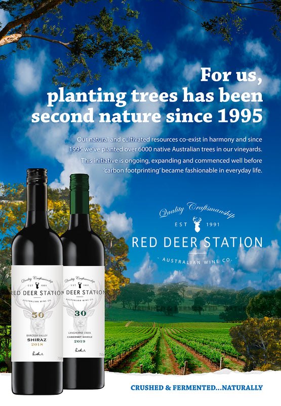 Red Deer Station sustainability poster with wine bottles and vineyard landscape
